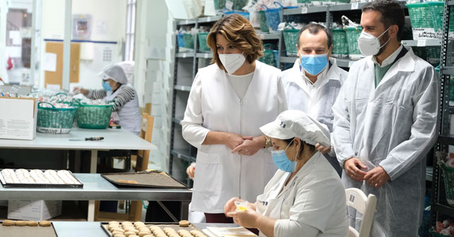 Visita de Susana Díaz a la fábrica de mantecados Torcadul, en Antequera, Málaga